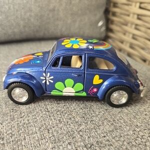 diecast car volkswagen classical beetle 1967 1/32 bug flowers blue
used and may